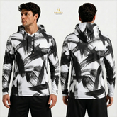 Man wearing a black and white abstract patterned hoodie, shown from front and back, on a light gray background.