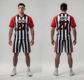 Lacrosse uniform with red, black, and white design on a gray background