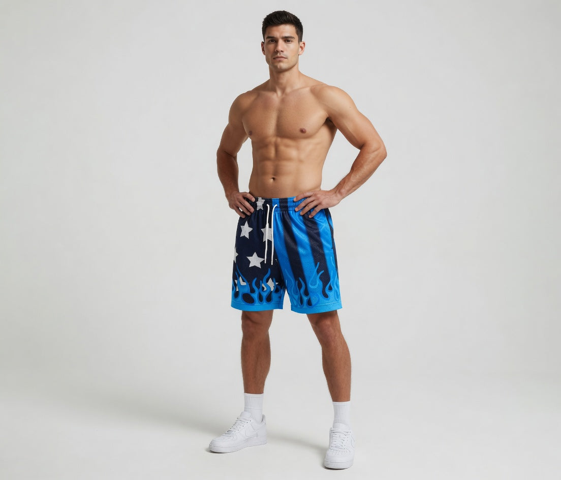 Man wearing blue shorts with a flag design on a white background