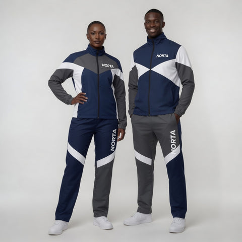 Two people wearing matching blue, gray, and white tracksuits with 'Norta' branding on a white background.