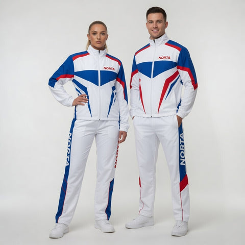 Two people wearing matching white tracksuits with blue and red accents on a white background.