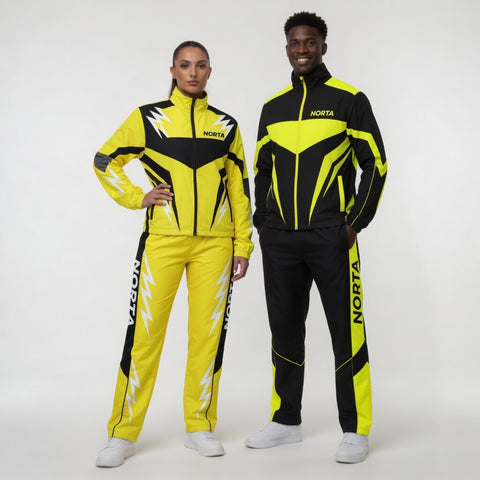Two people wearing yellow and black 'Norta' tracksuits on a white background